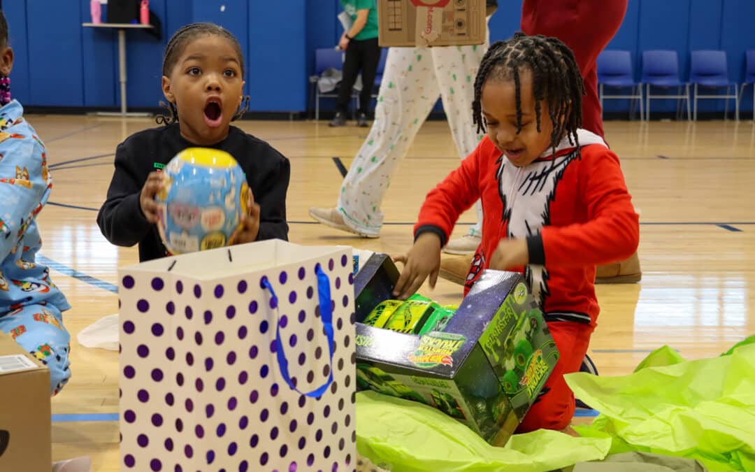 GDS students open gifts.